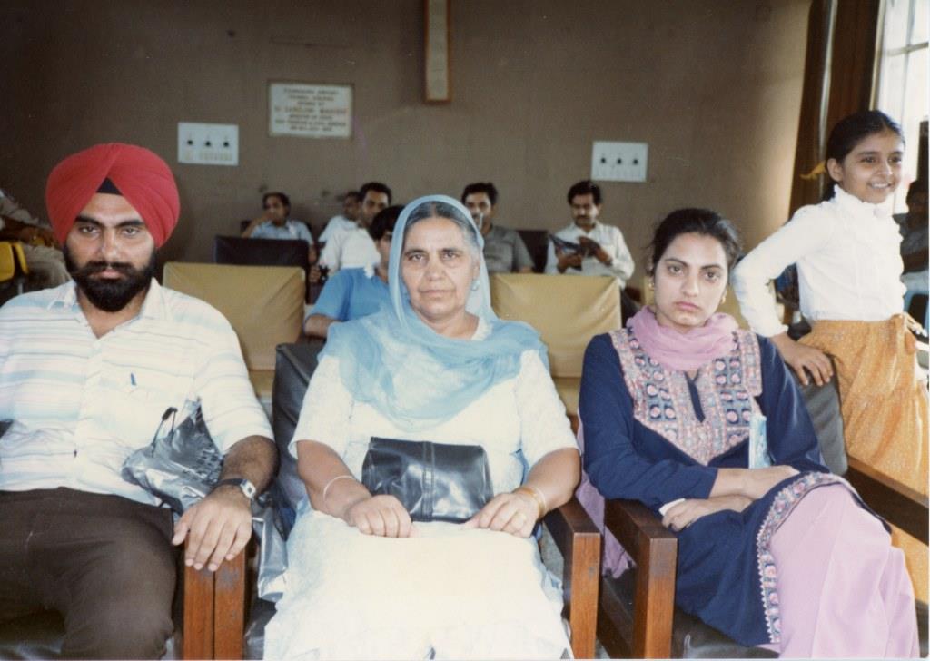 Jasbir Singh Kang Waiting With His Mother and Sister at the Chandigarh Airport Before Leaving for the U.S., 1986. Courtesy of the Kang Family.