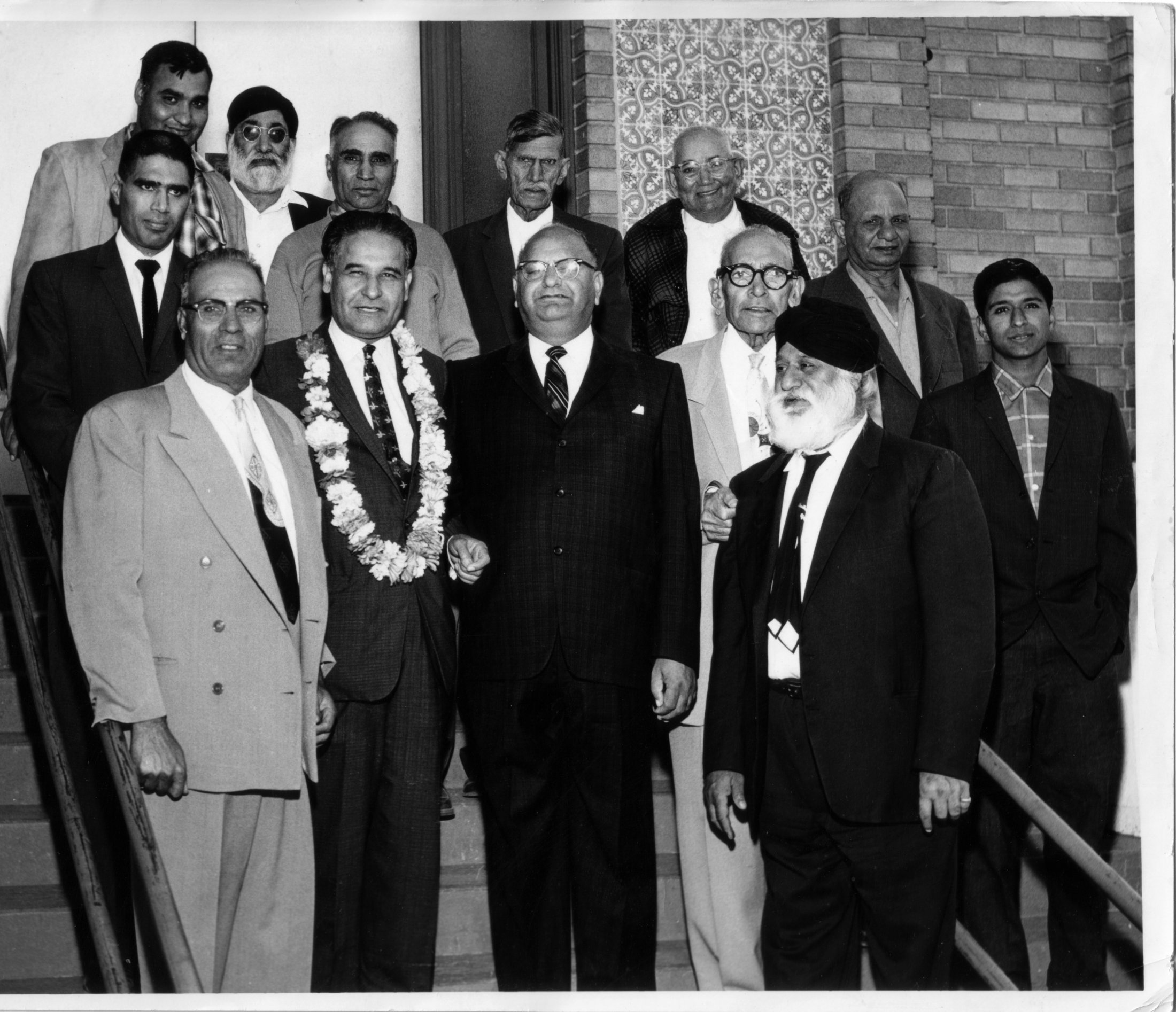Tuly Singh Johl with Dalip Singh Saund (Center Left With Garland). Courtesy of the Johl Family and the Punjabi American Heritage Society.