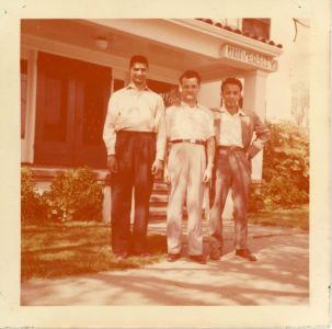Arrival in Davis, CA, Corner of B and 2nd Streets, With Two Friends, 1957.  Courtesy of the Khush Family.