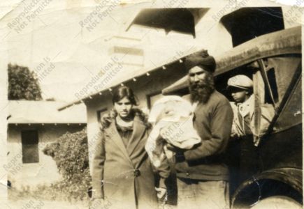 The family bringing home new baby, the Singhs' first-born daughter.  Marysville, 1929.  Courtesy of the Puna Singh and Nand Kaur Family.