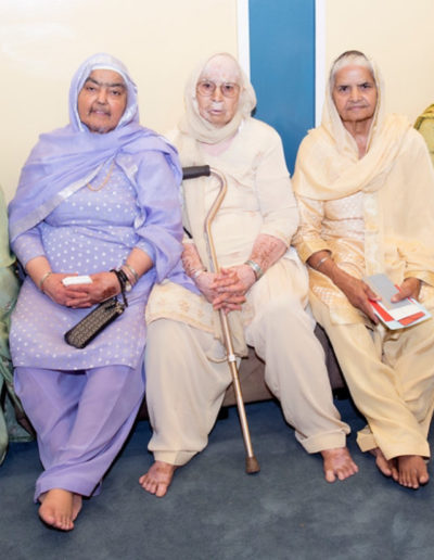 Harbhajan (left) with her sisters-in-law Preetam Kaur (middle) and Swaran Kaur Purewal (right), Yuba City Sikh Temple, Yuba City, 2016.