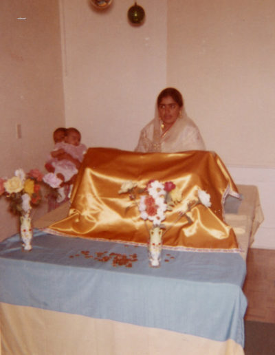 Harbhajan reading the Sikh scripture, Yuba City, 1961.
