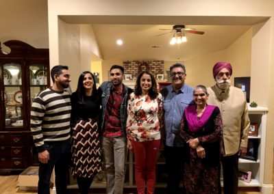 Joginder with fanmily (left to right) Hardeep and Aman Johl, Tarin Dhaliwal, Sharon and Dal Dhaliwal, and Joginder and Mohinder Dhaliwal