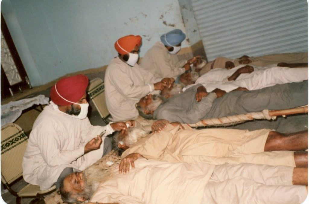 011 JSK with Doctors—Performing Eye Surgery on Villagers, India 1984